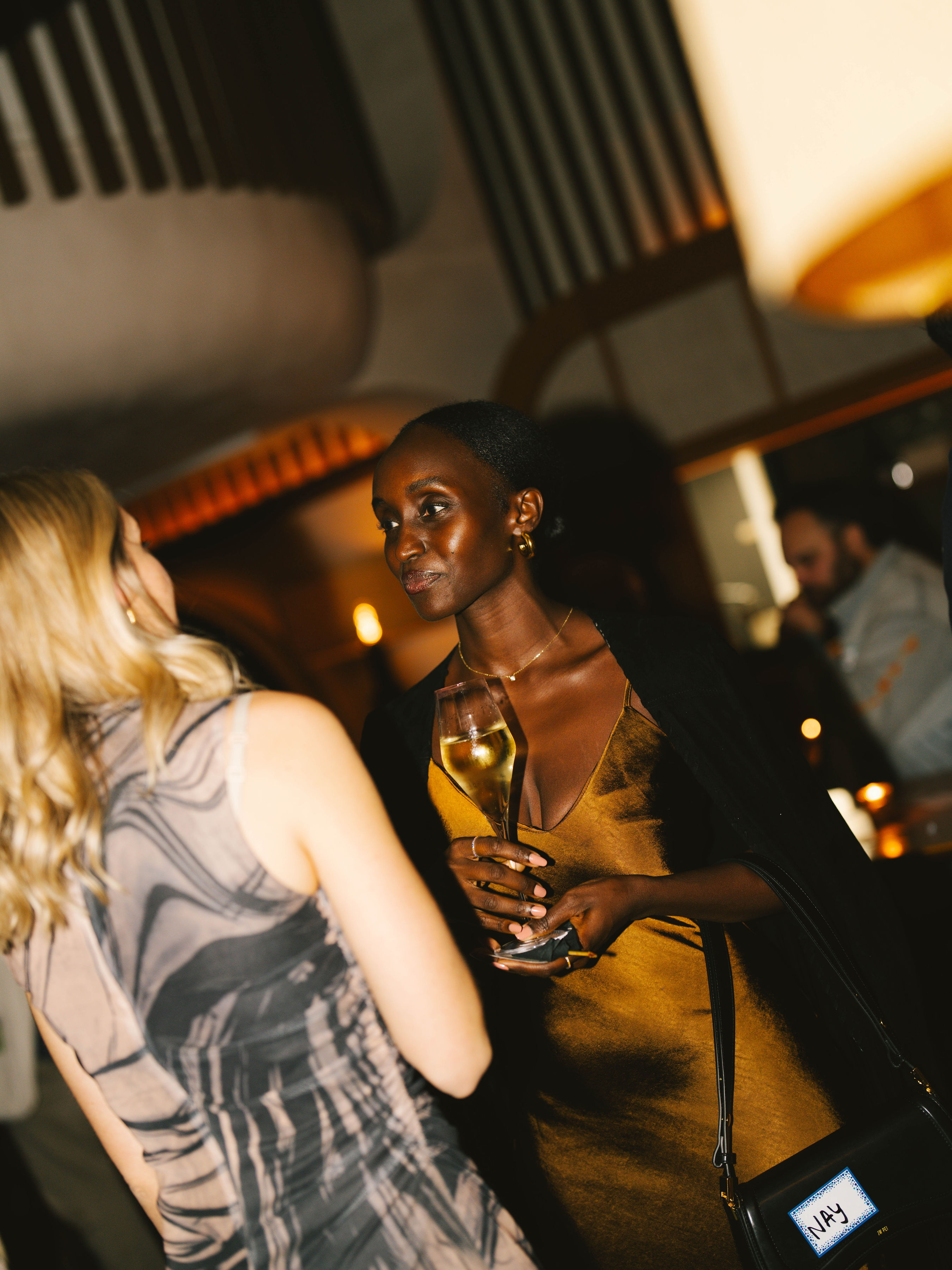 Two women in conversation at Anti-Networking event